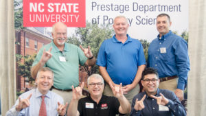 Dean Richard Linton with industry members and Extension faculty