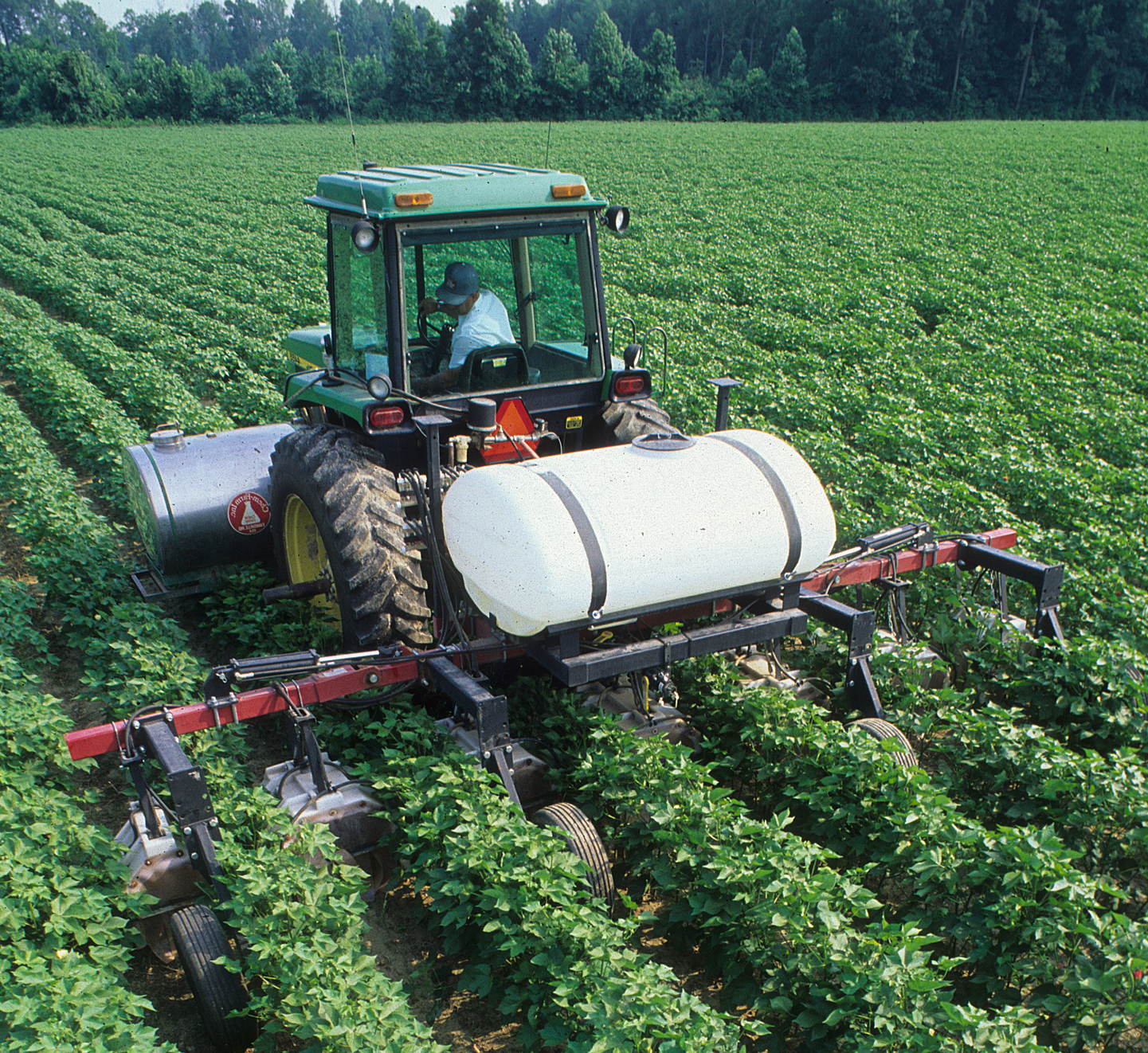 Agriculture - Tractor And Applicator Side Dressing Fertilize